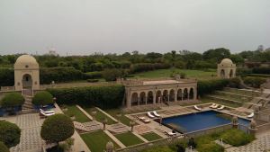 Balcony view of the gorgeous grounds/pool and the Taj Mahal in the background ... Made for royalty